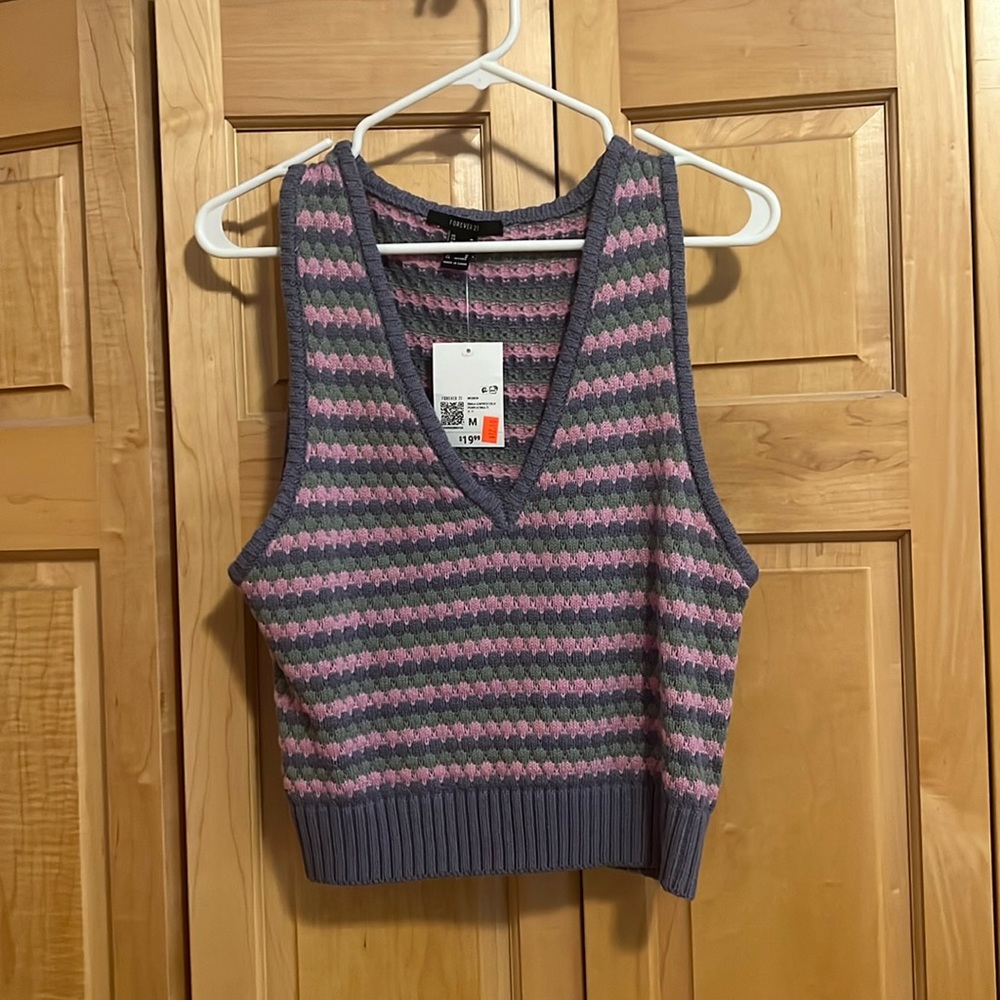 Pink, purple, and green sweater vest